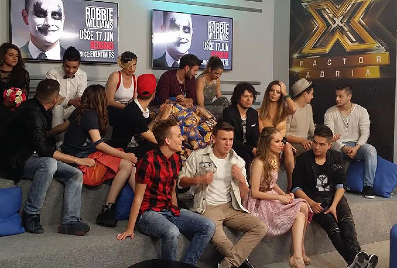 Finalisti X Factora nastupaju na koncertu Robbia Williamsa