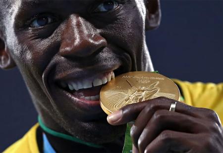 https://storage.bljesak.info/article/462210/450x310/usain-bolt-grize-medalju.jpg