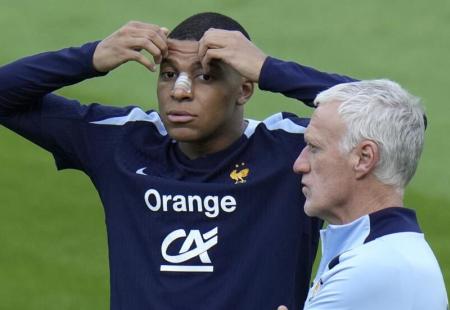 https://storage.bljesak.info/article/468574/450x310/mbappe-Deschamps.jpeg