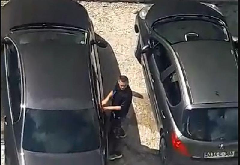 Snimka pokušaja krađe - Mostar: Snimljen kako obija automobil usred bijela dana