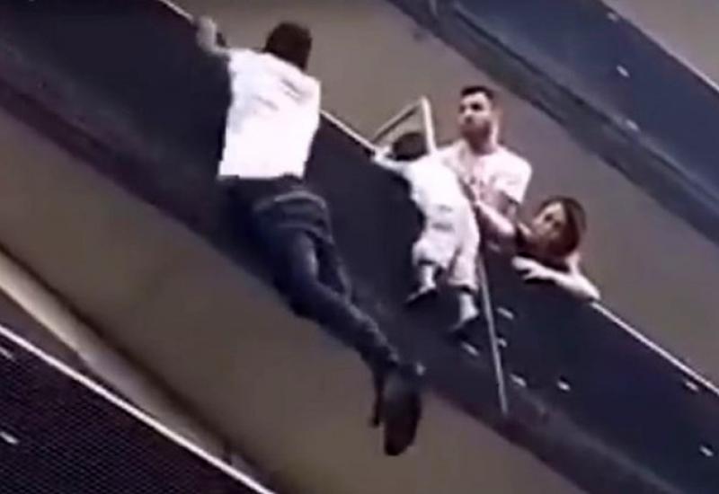 Ilustracija - Migrant se popeo na zgradu da bi spasio dječaka koji je visio s balkona