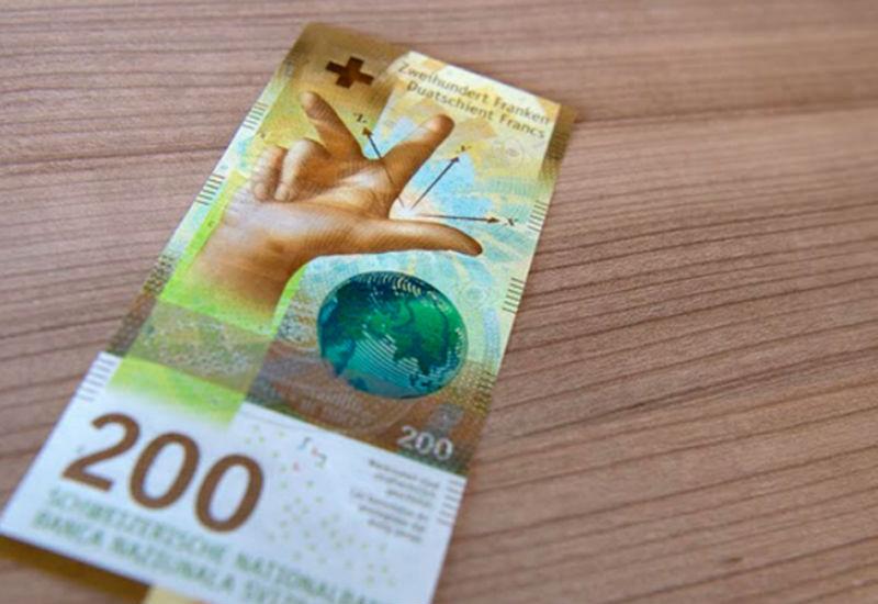 Frka zbog tri prsta na švicarskoj novčanici