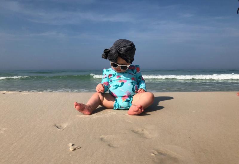 Dijete na plaži - Kako namazati kremom za sunčanje dijete koje se ne želi mazati