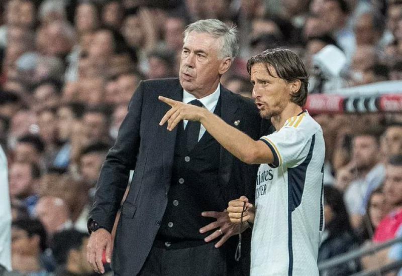 Carlo Ancelotti i Luka Modrić - Modrić obećao Ancelottiju: Treneru, neću otići!
